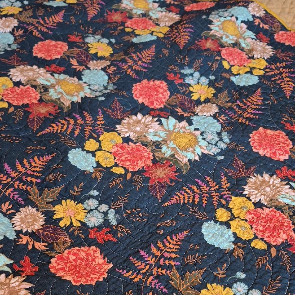 Reversable Floral Quilt with Vibrant Accents
